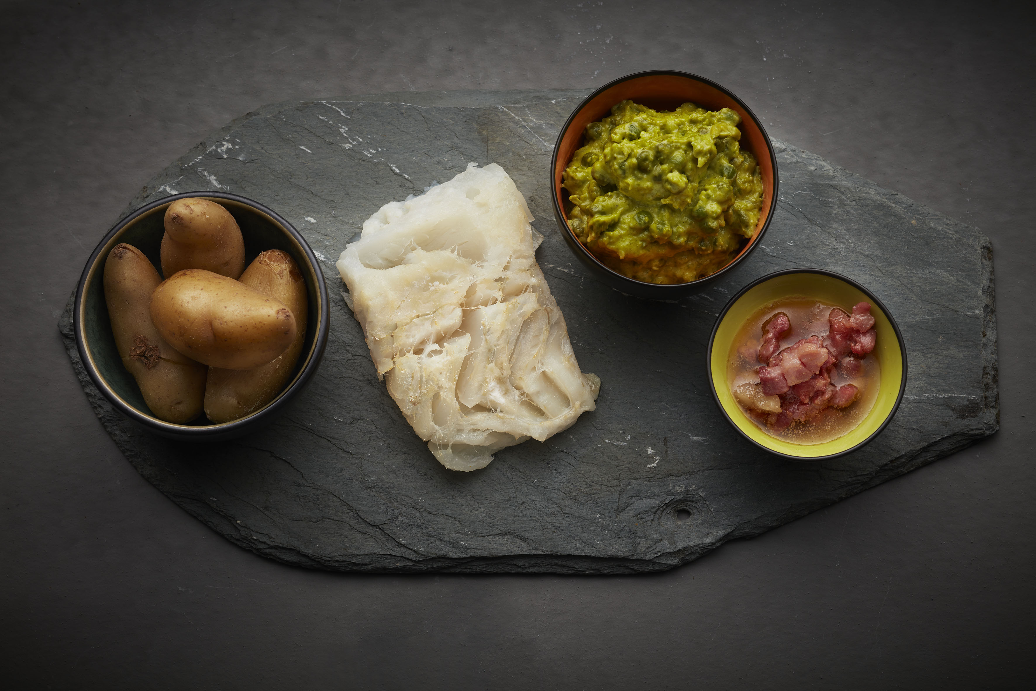 Lutefisk med ertepuré og mandelpotet